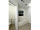 Bathroom featuring a soaking tub with tile flooring, a window, and natural light at 2517 Oakleaf Rdg, Lithonia, GA 30058
