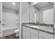 Bathroom with granite countertop, modern fixtures, and a bathtub-shower combo at 5326 Tolar Rd # 29, South Fulton, GA 30213