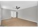 A spacious bedroom features neutral walls, carpet flooring, and a ceiling fan at 5326 Tolar Rd # 29, South Fulton, GA 30213
