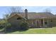 Exterior view of backyard with grass and patio at 172 Willow Springs Ln, Stockbridge, GA 30281