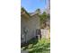Home's side showing central A/C and fenced yard offering convenience and privacy at 172 Willow Springs Ln, Stockbridge, GA 30281