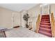 Inviting entryway with tiled floors, a staircase, and ample space at 3121 Cruse Rd, Lawrenceville, GA 30044