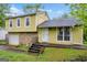 Charming two-story home with a stone facade, attached garage, and inviting front entrance at 3121 Cruse Rd, Lawrenceville, GA 30044