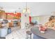 Open kitchen and dining area featuring tile floors and oak cabinets at 3121 Cruse Rd, Lawrenceville, GA 30044