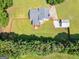 Aerial view of the home with a spacious, fenced backyard at 303 Mill Glen Ct, Mcdonough, GA 30252