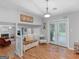 Inviting entryway with hardwood floors, neutral walls, and charming decor at 303 Mill Glen Ct, Mcdonough, GA 30252