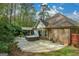Spacious backyard with a patio, hot tub, and a covered seating area, perfect for outdoor living at 4360 Derrick Rd, South Fulton, GA 30349