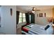 Comfortable bedroom featuring neutral walls, a ceiling fan, and natural light from the window at 4360 Derrick Rd, South Fulton, GA 30349