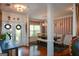 Elegant dining room features wood floors and large windows for ample natural light at 4360 Derrick Rd, South Fulton, GA 30349