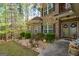 Inviting front porch with landscaped garden and a secure Vivint security system at 4360 Derrick Rd, South Fulton, GA 30349