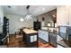 Modern kitchen featuring granite countertops, a butcher block island, and stainless appliances at 4360 Derrick Rd, South Fulton, GA 30349