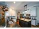 Well-appointed kitchen with stone countertops, island, and stainless steel appliances at 4360 Derrick Rd, South Fulton, GA 30349