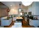 Well-lit kitchen with an island, granite countertops, and stainless steel appliances at 4360 Derrick Rd, South Fulton, GA 30349