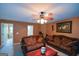 Inviting living room with comfortable seating, carpet, and neutral tones at 4360 Derrick Rd, South Fulton, GA 30349