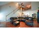 Bright living room with high ceilings and hardwood floors, flowing into the kitchen area at 4360 Derrick Rd, South Fulton, GA 30349