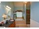 Relax in the spa-like main bathroom, featuring a soaking tub and separate glass shower at 4360 Derrick Rd, South Fulton, GA 30349