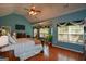 Spacious main bedroom boasts high ceilings, bay windows, and ensuite bathroom access at 4360 Derrick Rd, South Fulton, GA 30349