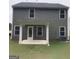 The backyard features a covered patio perfect for outdoor gatherings and relaxing at 5364 Tolar Road # 74, South Fulton, GA 30213