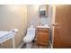 Compact bathroom featuring essential fixtures, ideal for everyday use and functionality at 361 Cecil Hunter Rd, Moreland, GA 30259
