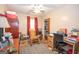 Functional bedroom with desk, providing a versatile space for work, study, and relaxation at 361 Cecil Hunter Rd, Moreland, GA 30259