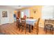 Lovely dining room with wooden furniture, a white tablecloth, and natural light at 361 Cecil Hunter Rd, Moreland, GA 30259