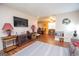 Spacious living room featuring laminate floors, contemporary decor, and an open layout at 361 Cecil Hunter Rd, Moreland, GA 30259