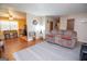 The living room features laminate floors and a large sofa at 361 Cecil Hunter Rd, Moreland, GA 30259