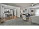 Open-concept living space connecting the living room with the eat-in kitchen area, creating a seamless flow at 214 Windgate Ct, Peachtree City, GA 30269