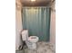 Small bathroom features marble floors and a toilet at 2316 Emerald Dr, Jonesboro, GA 30236