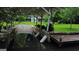 Covered boat dock on the water with boat bumpers ready for adventure at 2316 Emerald Dr, Jonesboro, GA 30236