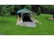 Picturesque boat house nestled in a beautifully landscaped yard with lush greenery at 2316 Emerald Dr, Jonesboro, GA 30236