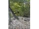 Backyard with gravel and view of canal at 2316 Emerald Dr, Jonesboro, GA 30236
