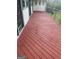 Spacious red wooden deck overlooking the yard at 2316 Emerald Dr, Jonesboro, GA 30236