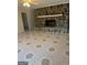 Inviting living room boasts a stone fireplace and tile flooring at 2316 Emerald Dr, Jonesboro, GA 30236