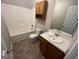 Bathroom with tub and shower, sink and vanity at 194 Bay Court Dr, Stockbridge, GA 30281