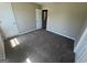 Spacious bedroom with carpet, closet, and doorway at 194 Bay Court Dr, Stockbridge, GA 30281