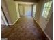 Tiled mud room or entryway with backyard access and multiple storage closets at 194 Bay Court Dr, Stockbridge, GA 30281