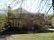 Well maintained backyard features a deck and lush lawn, great for outdoor entertaining at 1201 Turtle Creek Ct, Lawrenceville, GA 30043