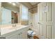 Standard bathroom featuring a single sink vanity and shower-tub combination at 1201 Turtle Creek Ct, Lawrenceville, GA 30043