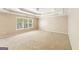 Bright bedroom with neutral carpet, trey ceiling and large window at 1201 Turtle Creek Ct, Lawrenceville, GA 30043