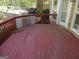 Spacious wooden deck with built in grill, ideal for outdoor gatherings at 1201 Turtle Creek Ct, Lawrenceville, GA 30043