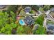 Aerial view of the home showcasing the backyard pool and surrounding mature trees at 229 Primstone Way, Mcdonough, GA 30253