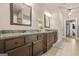 A bathroom with granite countertops, double sinks, tile floor and custom cabinets at 229 Primstone Way, Mcdonough, GA 30253