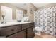 Neutral bathroom with modern vanity, shower and lots of functional space and storage at 229 Primstone Way, Mcdonough, GA 30253
