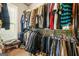A walk-in closet filled with clothes and other accessories at 229 Primstone Way, Mcdonough, GA 30253
