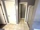 Bathroom featuring shower with glass door and tile flooring at 4254 Wood Cove Dr, Snellville, GA 30039