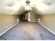 Large bonus room with neutral carpet and multiple doorways at 4254 Wood Cove Dr, Snellville, GA 30039