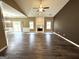 Spacious living room with hardwood floors and fireplace, perfect for gatherings at 4254 Wood Cove Dr, Snellville, GA 30039