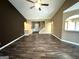 Expansive living space featuring beautiful hardwood floors and neutral walls at 4254 Wood Cove Dr, Snellville, GA 30039