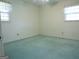 Standard bedroom with green carpet, basic lighting and a window with a view at 30 Hickory Dr, Stockbridge, GA 30281